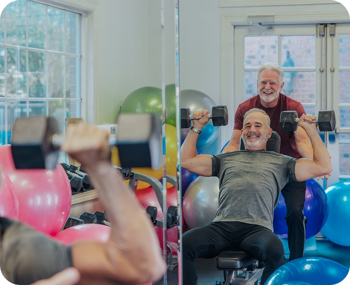 senior men lifting weights